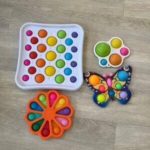 Hard plastic dimple pop perfect for babies sanitizable like new 4 total fodgets